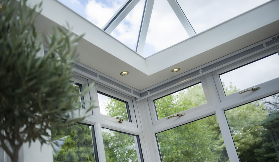 Downlighters fitted to a white orangery