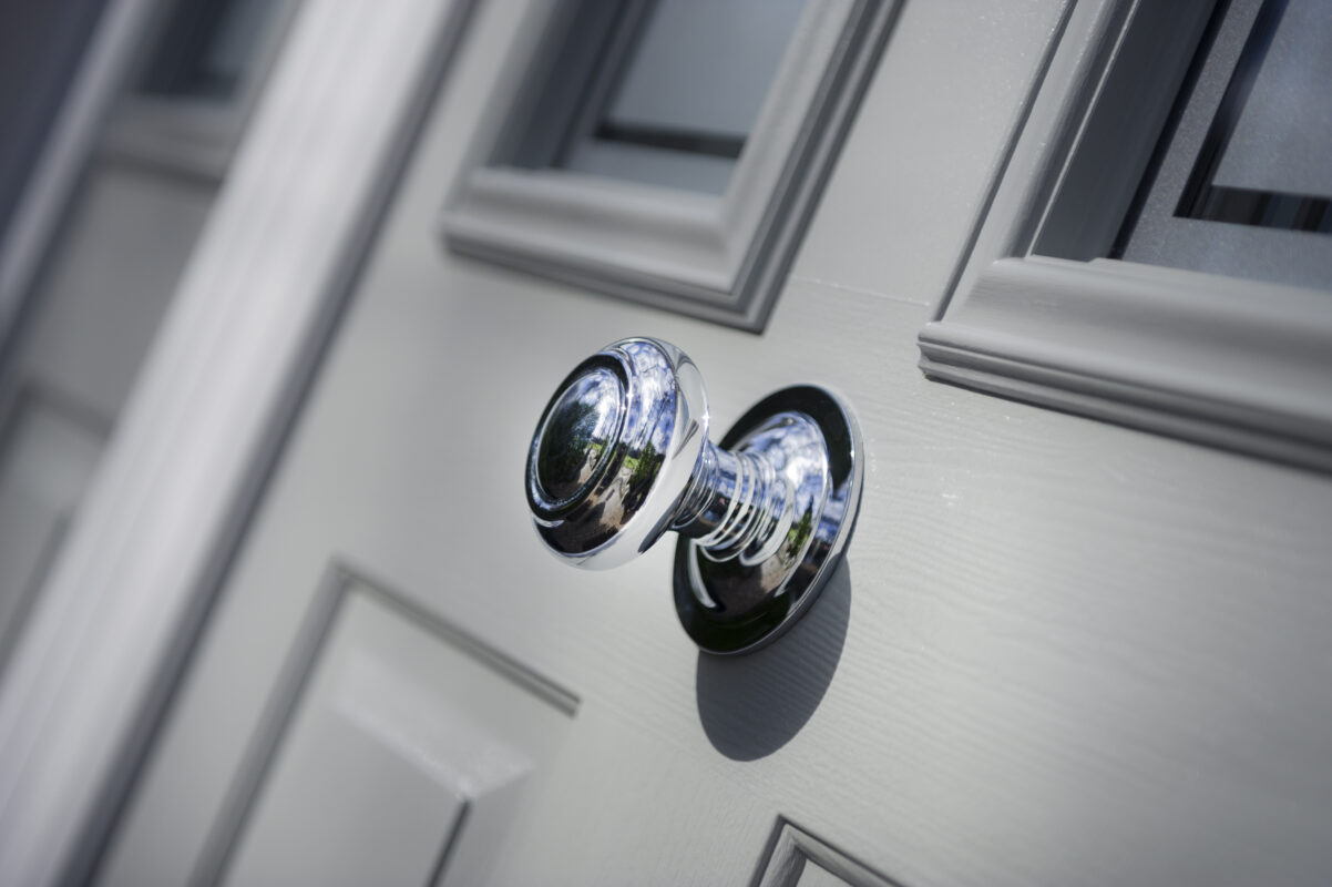 Composite door with high security fittings